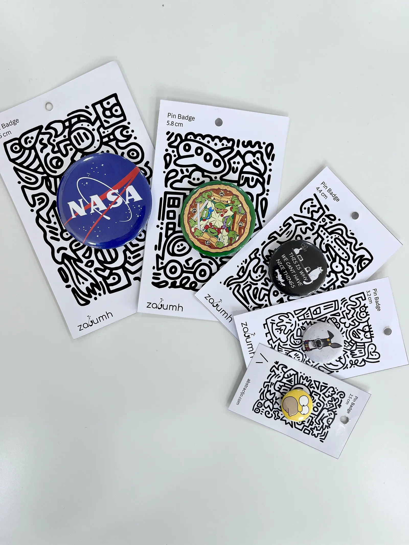 Pin Badges - خدمات - أبستراكت